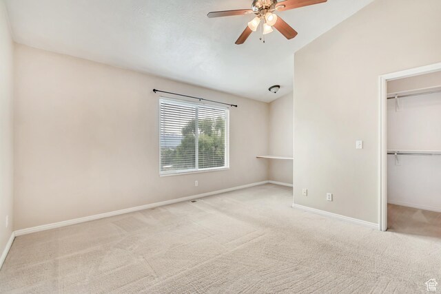 768 E 1740 S Unit 768, Orem, UT 84097 - unfurnished bedroom featuring carpet flooring, baseboards, a spacious closet, a closet, and lofted ceiling