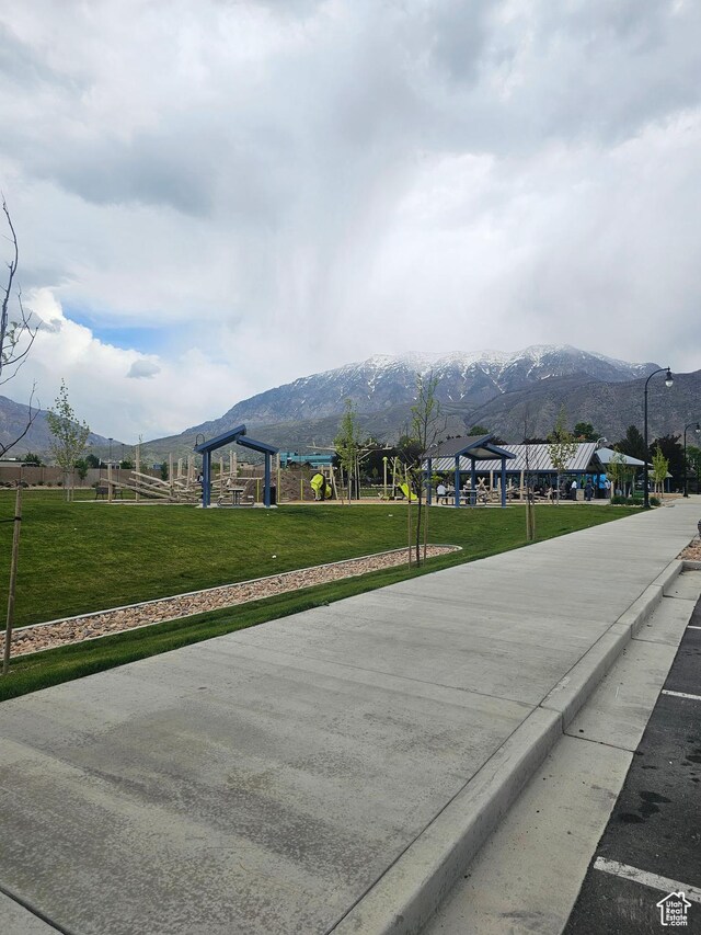 768 E 1740 S Unit 768, Orem, UT 84097 - view of street with a mountain view, street lighting, and sidewalks