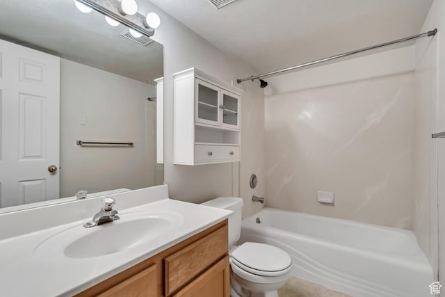 full bathroom with  shower combination, toilet, and vanity
