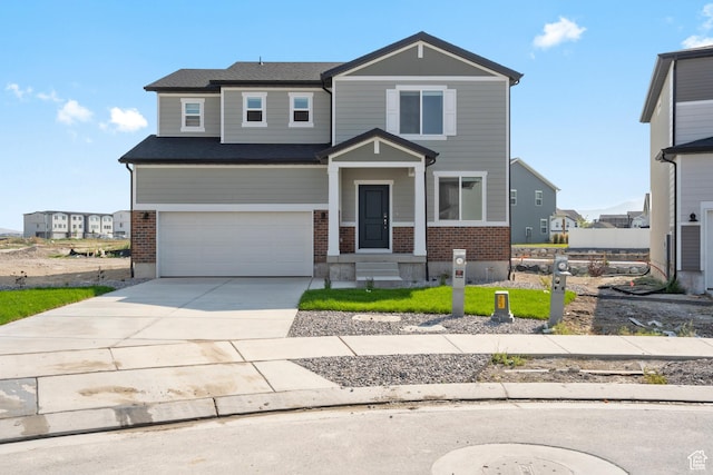 3523 N Browning St Unit 1233, Eagle Mountain, UT 84005 - view of front of home with brick siding, a garage, and concrete driveway