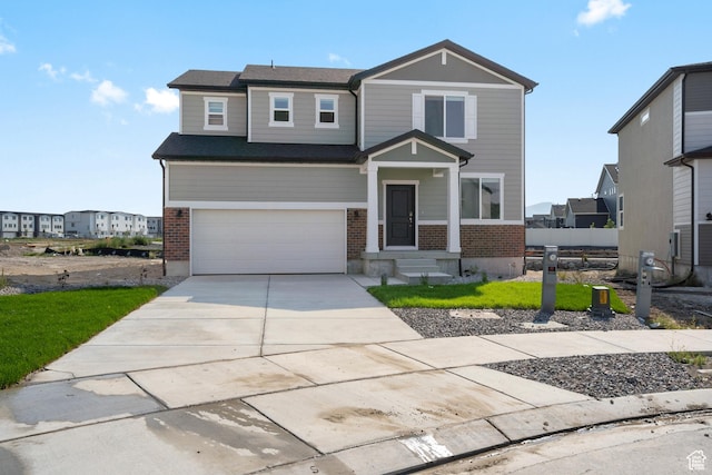 3523 N Browning St Unit 1233, Eagle Mountain, UT 84005 - view of front of home with brick siding, a garage, concrete driveway, and a front lawn