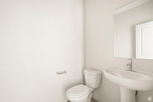 3523 N Browning St Unit 1233, Eagle Mountain, UT 84005 - bathroom with baseboards and toilet