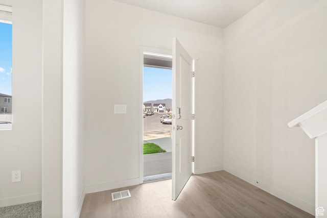3523 N Browning St Unit 1233, Eagle Mountain, UT 84005 - foyer with baseboards and wood finished floors
