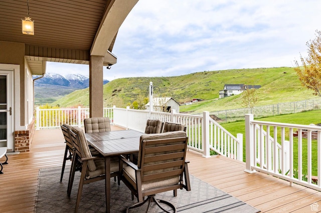 4248 N Sego Lily Rd, Morgan, UT 84050 - deck featuring outdoor dining area, a mountain view, and a rural view