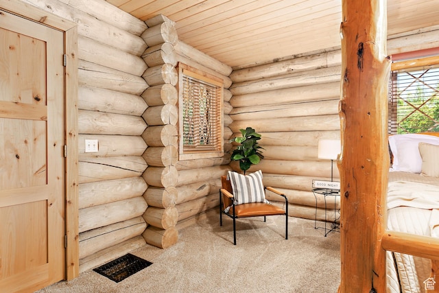 living area with carpet floors, rustic walls, and wood ceiling