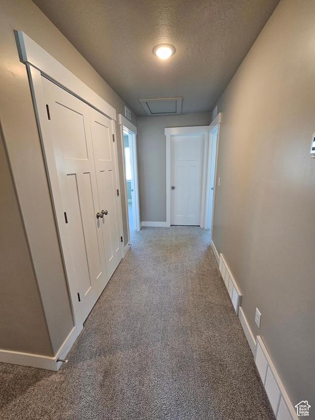 542 N 1400 W Lot 29, Springville, UT 84663 - hallway featuring a textured ceiling, carpet, baseboards, and attic access