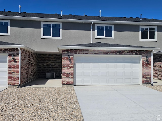 542 N 1400 W Lot 29, Springville, UT 84663 - view of front facade featuring brick siding, an attached garage, and driveway