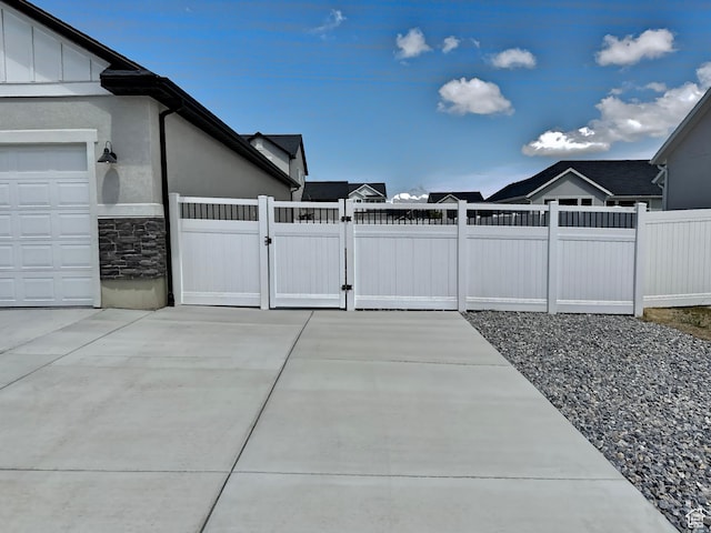167 E Craner Peak Dr, Eagle Mountain, UT 84005 - view of patio featuring fence and a gate