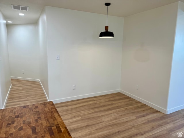 167 E Craner Peak Dr, Eagle Mountain, UT 84005 - unfurnished dining area featuring baseboards, light wood-type flooring, and recessed lighting