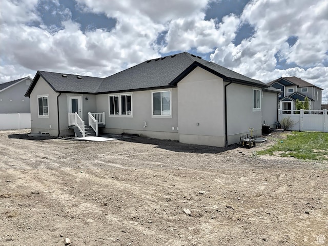 167 E Craner Peak Dr, Eagle Mountain, UT 84005 - back of property with fence and stucco siding