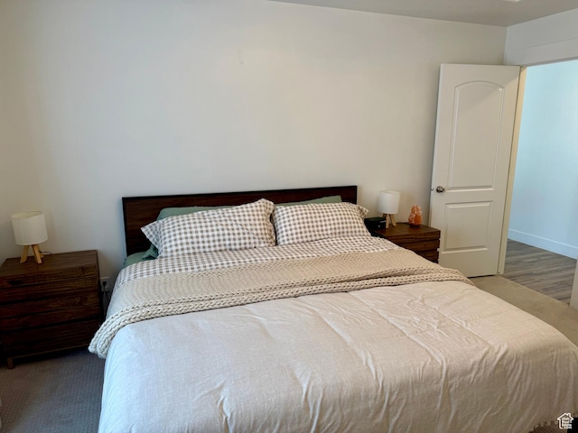 167 E Craner Peak Dr, Eagle Mountain, UT 84005 - bedroom featuring wood finished floors and baseboards