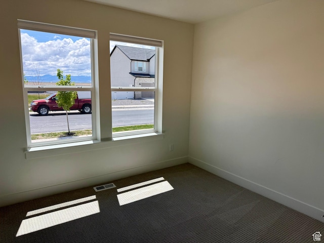 167 E Craner Peak Dr, Eagle Mountain, UT 84005 - empty room featuring carpet and baseboards
