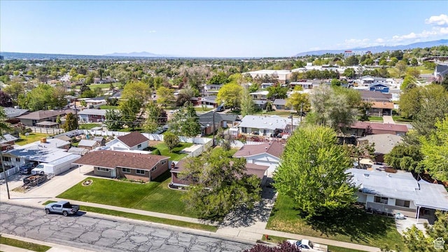 aerial perspective of suburban area with a mountain backdrop