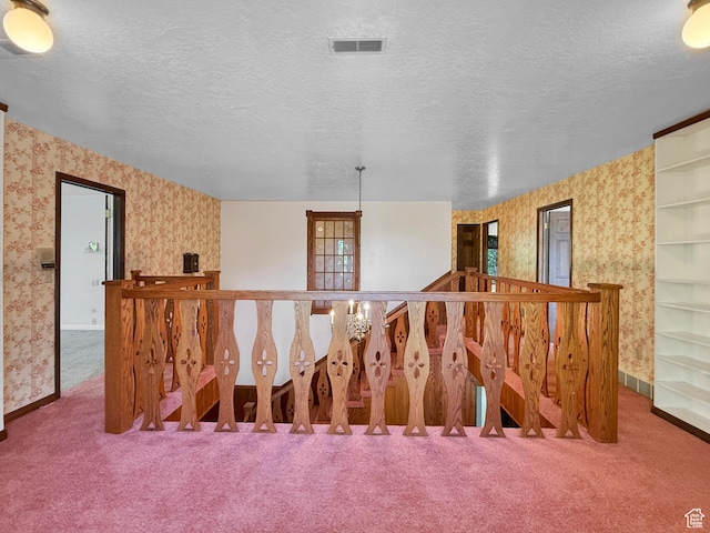 1145 E 1675 N, North Ogden, UT 84404 - staircase featuring wallpapered walls, carpet, baseboards, and a textured ceiling