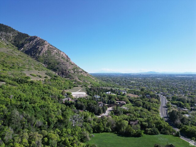 1145 E 1675 N, North Ogden, UT 84404 - aerial view of property and surrounding area featuring a heavily wooded area and mountains