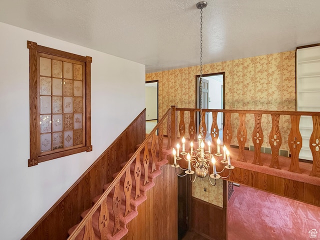 1145 E 1675 N, North Ogden, UT 84404 - hallway featuring a chandelier and wallpapered walls