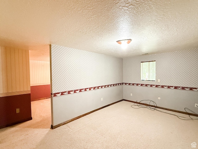 1145 E 1675 N, North Ogden, UT 84404 - carpeted spare room featuring a textured ceiling and wallpapered walls