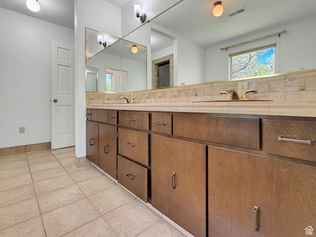1145 E 1675 N, North Ogden, UT 84404 - full bath featuring tile patterned flooring, double vanity, and decorative backsplash