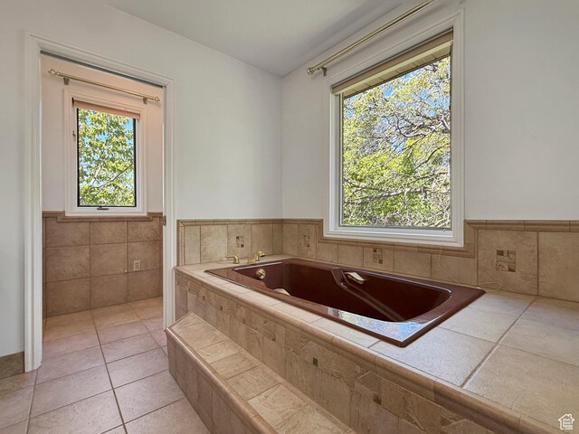 1145 E 1675 N, North Ogden, UT 84404 - bathroom featuring a bath, a wainscoted wall, and tile patterned flooring