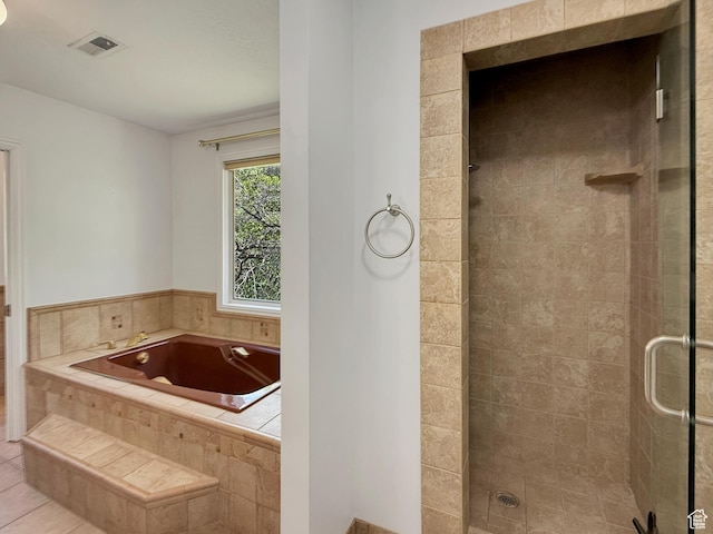 1145 E 1675 N, North Ogden, UT 84404 - bathroom featuring a stall shower, a bath, and tile patterned floors