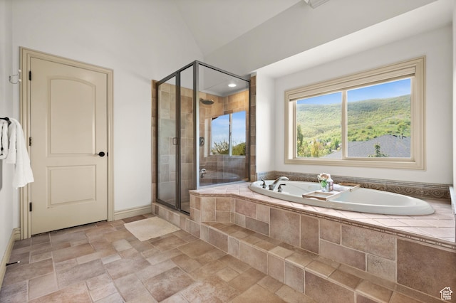 1161 Woodcrest Ln, North Salt Lake, UT 84054 - full bathroom featuring a stall shower, stone finish flooring, a bath, and baseboards