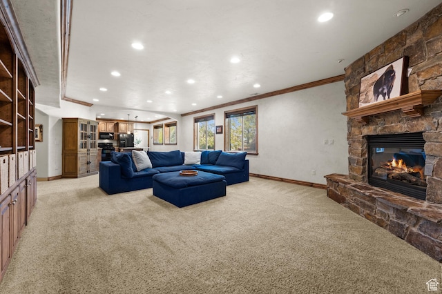 1161 Woodcrest Ln, North Salt Lake, UT 84054 - living room with light carpet, ornamental molding, recessed lighting, a fireplace, and baseboards