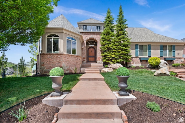 1161 Woodcrest Ln, North Salt Lake, UT 84054 - view of front facade with brick siding and a shingled roof