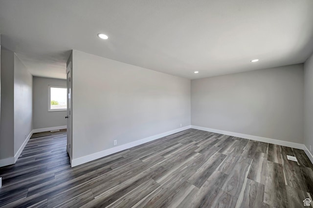 5775 S Brandy Wine S, Taylorsville, UT 84129 - spare room featuring dark wood-style flooring, baseboards, and recessed lighting