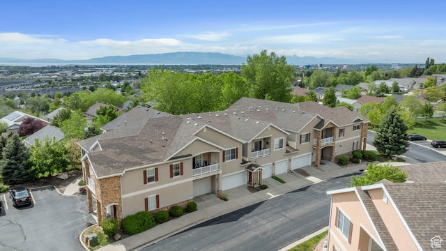 view of subject property featuring a mountain backdrop
