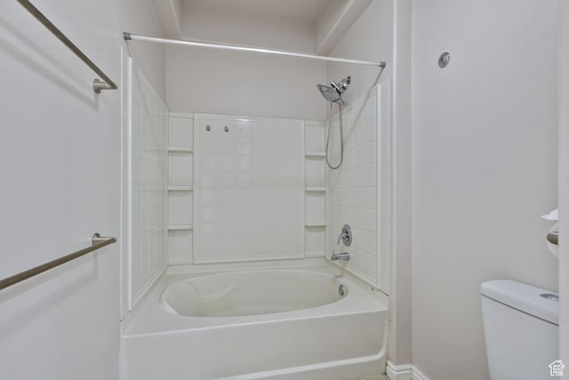 full bath with toilet, baseboards, and bathtub / shower combination