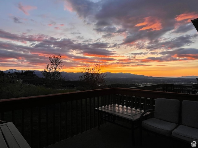 wooden terrace with a mountain view