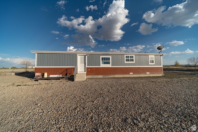 1691 E 8900 S, Price, UT 84501 - manufactured / mobile home with brick siding, entry steps, and board and batten siding