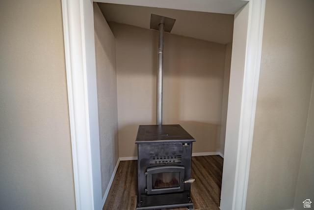 1691 E 8900 S, Price, UT 84501 - detailed view of a wood stove, wood finished floors, and baseboards
