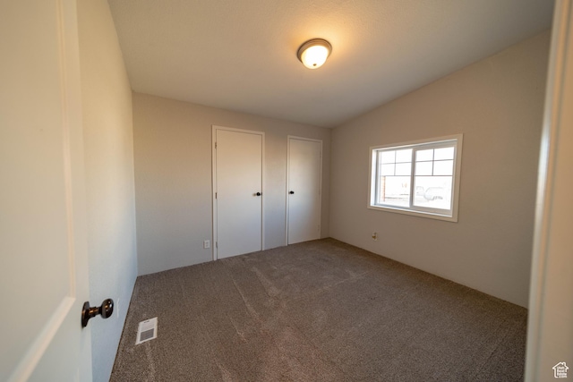 1691 E 8900 S, Price, UT 84501 - unfurnished bedroom with carpet and lofted ceiling