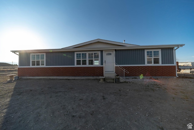 1691 E 8900 S, Price, UT 84501 - view of front of home with entry steps, brick siding, and board and batten siding
