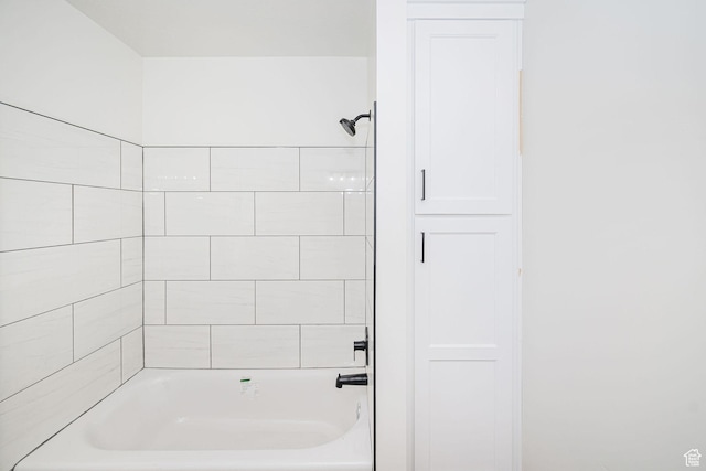 bathroom with shower / bath combination