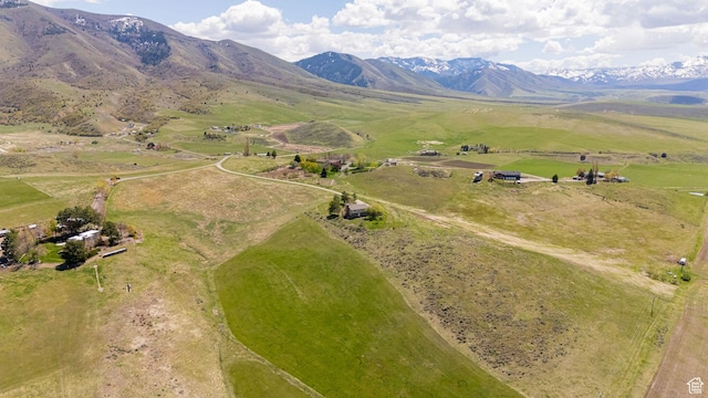 aerial view of property's location featuring rural landscape and mountains
