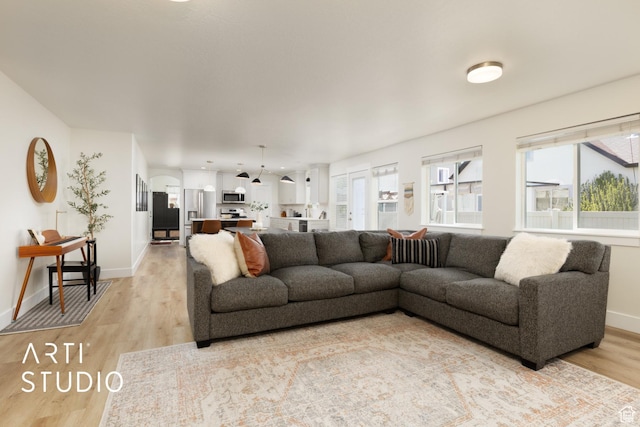1340 S 740 E, Lehi, UT 84043 - living area featuring light wood-style floors and baseboards