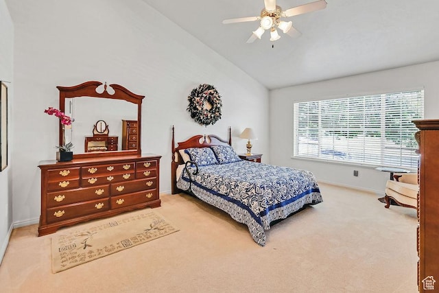 bedroom featuring lofted ceiling, carpet flooring, baseboards, and a ceiling fan