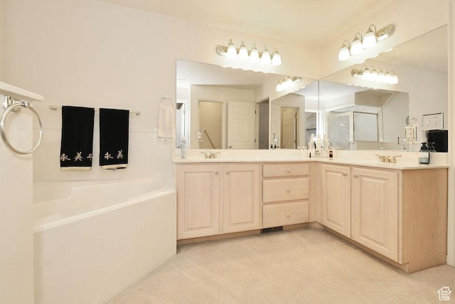 full bathroom with a garden tub, double vanity, and carpet flooring