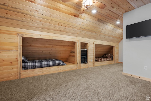 unfurnished bedroom featuring wooden ceiling, carpet floors, lofted ceiling, wooden walls, and recessed lighting