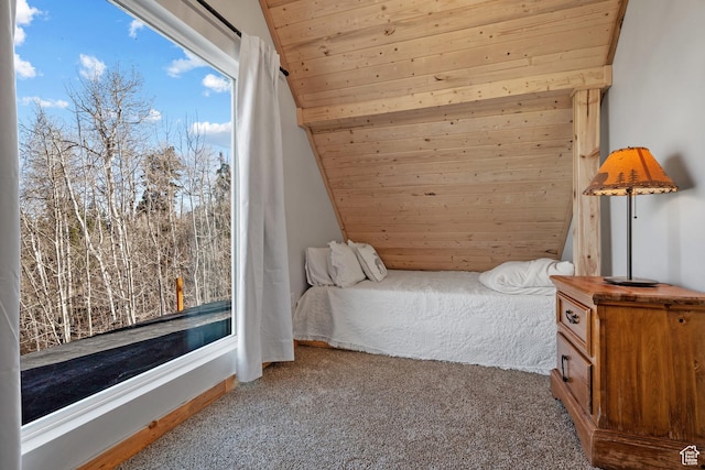 bedroom featuring carpet flooring, vaulted ceiling, and wooden ceiling