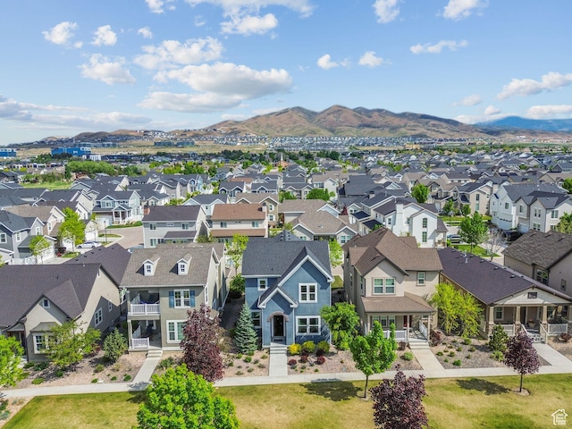 aerial view of residential area with a mountainous background