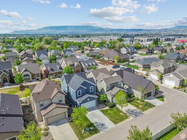 aerial view of residential area with a mountainous background