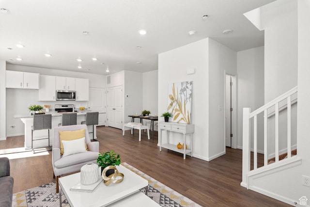342 N Colonnade Rd Unit 989, Saratoga Springs, UT 84045 - living area featuring recessed lighting, dark wood-type flooring, baseboards, and stairway