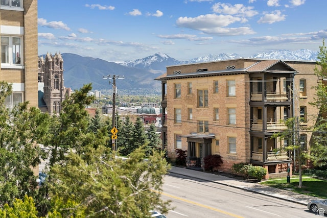 view of building exterior with a mountain view