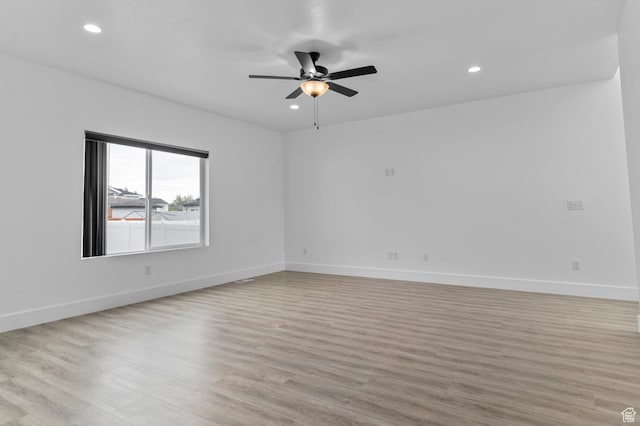 unfurnished room featuring light wood-style flooring, recessed lighting, baseboards, and ceiling fan