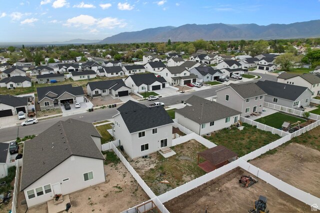 aerial view of residential area with mountains