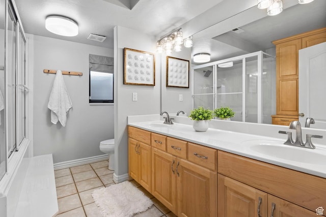 bathroom featuring an enclosed shower, tile patterned flooring, toilet, and double vanity