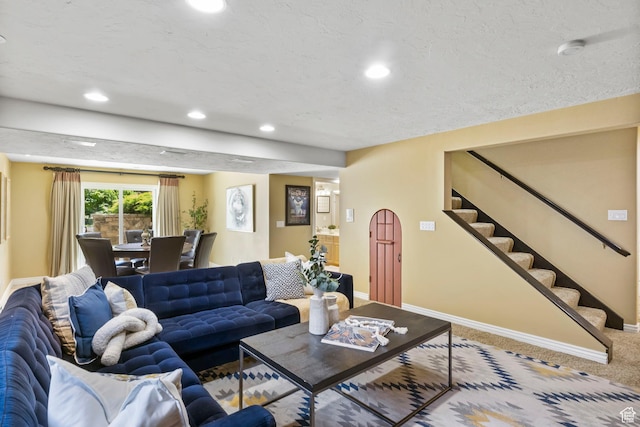 living area with stairway, recessed lighting, baseboards, and carpet flooring